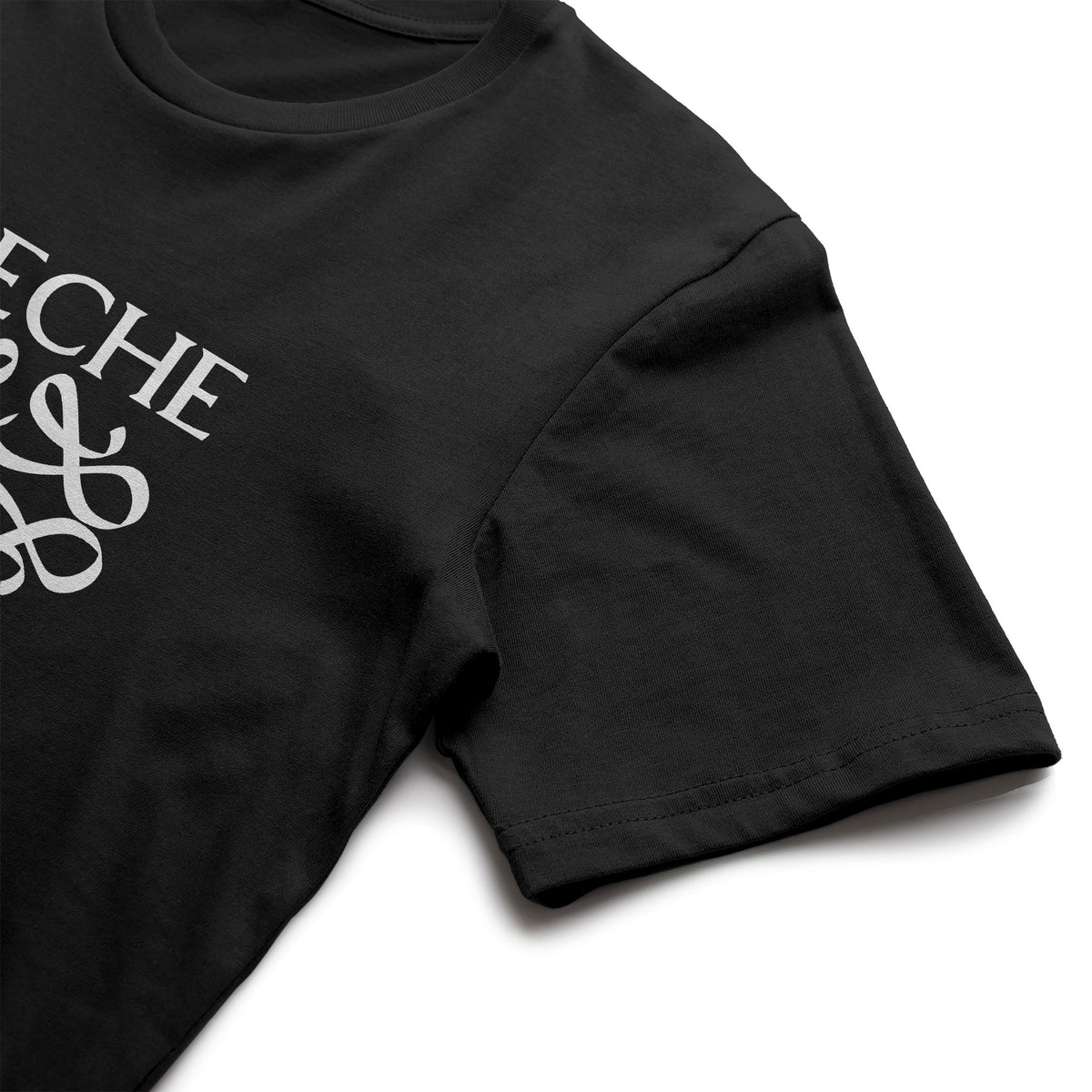 Black adult tee with white Leche logo, back view